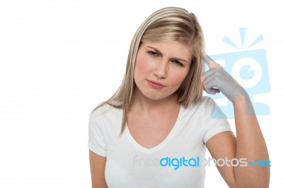 Portrait Of A Thoughtful Teen Blonde Girl Stock Photo