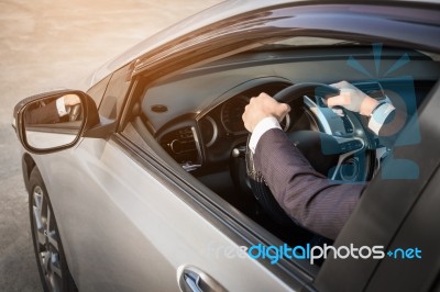 Portrait Of A Young Handsome Businessman Driving A Luxury Sports… Stock Photo