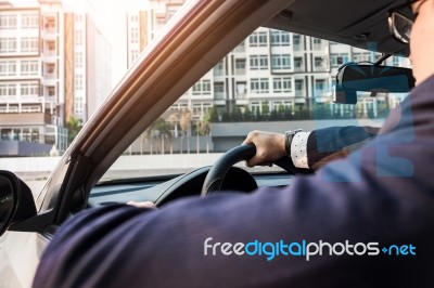 Portrait Of A Young Handsome Businessman Driving A Luxury Sports… Stock Photo