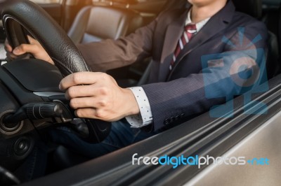 Portrait Of A Young Handsome Businessman Driving A Luxury Sports… Stock Photo