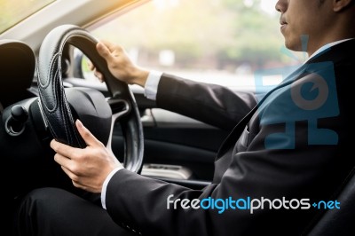 Portrait Of A Young Handsome Businessman Driving A Luxury Sports… Stock Photo