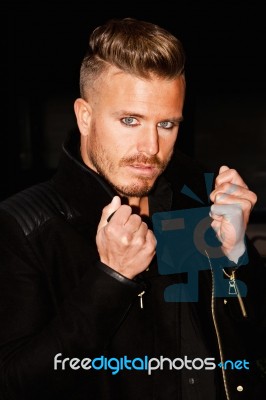 Portrait Of A Young Man With Blue Eyes Stock Photo