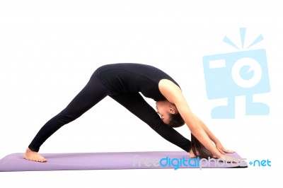 Portrait Of Asian Woman Wearing Black Body Suit Sitting In Yoga Meditation Position Isolated White Background Stock Photo