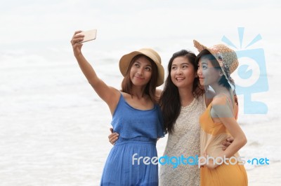 Portrait Of Asian Young Beautiful Woman Wearing Long Dress Stand… Stock Photo