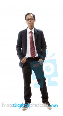 Portrait Of Asian Young Man Standing Stock Photo