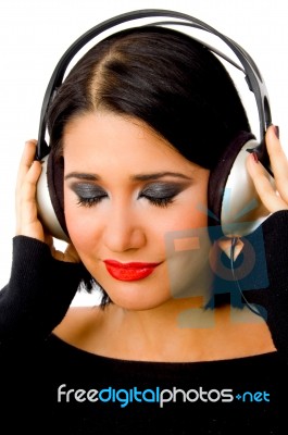 Portrait Of Beautiful Woman Listening Music Stock Photo