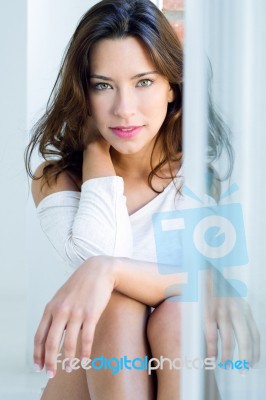 Portrait Of Beautiful Woman With Smile At Home Stock Photo