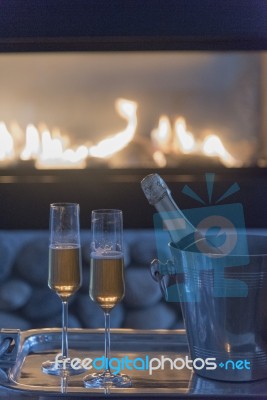 Portrait Of Champagne By The Fire Place Stock Photo