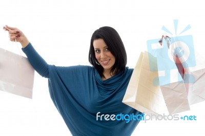 Portrait Of Cheerful Model With Carry Bags Stock Photo