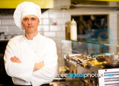 Portrait Of Confident Male Chef Stock Photo