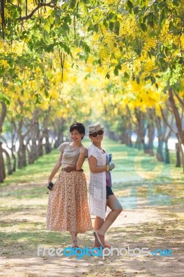 Portrait Of Couples Beautiful Asian Woman Standing In Blooming F… Stock Photo