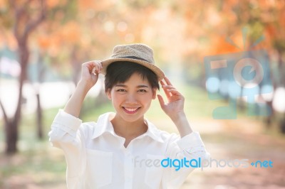 Portrait Of Couples Beautiful Asian Woman Standing In Blooming F… Stock Photo