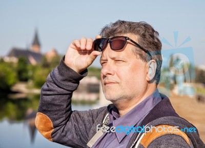 Portrait Of Elderly Man With Glasses Stock Photo