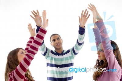 Portrait Of Friends With Raised Arms Stock Photo