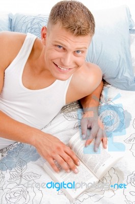 Portrait Of Guy Reading A Book Stock Photo