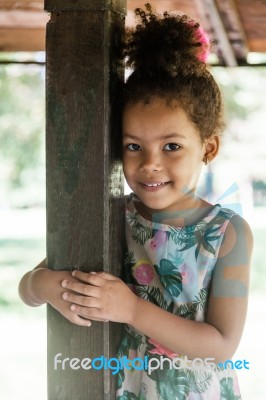 Portrait Of Half-caste Children In Park Stock Photo