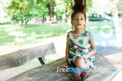 Portrait Of Half-caste Children In Park Stock Photo