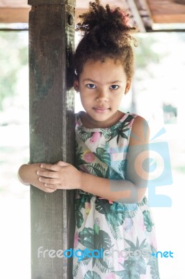 Portrait Of Half-caste Children In Park Stock Photo