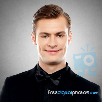 Portrait Of Handsome Businessman Posing Confidently Stock Photo