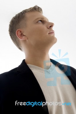 Portrait Of Handsome Man Looking Upward Stock Photo