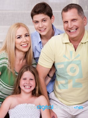 Portrait Of Happy Family Of Four Stock Photo