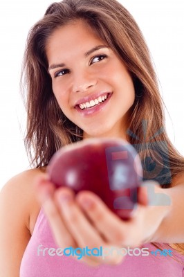 Portrait Of Happy Girl Showing Red Apple Stock Photo