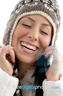 Portrait Of Happy Woman With Woolen Cap Stock Photo