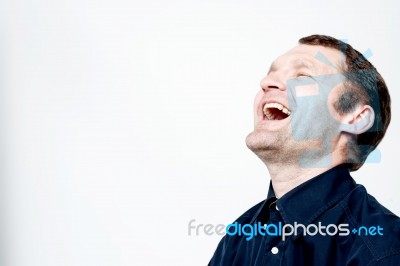 Portrait Of Hard Laughing Man Stock Photo