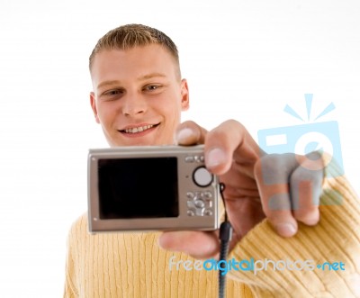 Portrait Of Man Holding Digital Camera Stock Photo