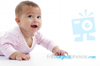 Portrait Of Playing Cute Baby Looking Upward Stock Photo