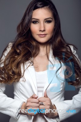 Portrait Of Pretty Young Woman Posing In The Studio Photo Stock Photo