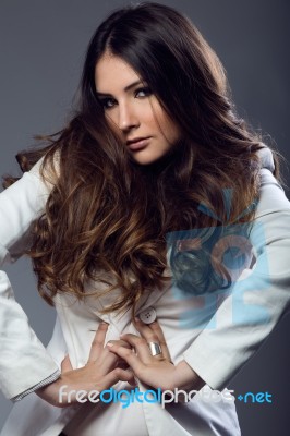 Portrait Of Pretty Young Woman Posing In The Studio Photo Stock Photo