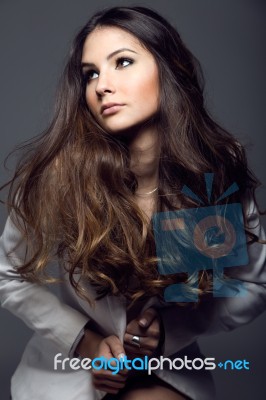 Portrait Of Pretty Young Woman Posing In The Studio Photo Stock Photo