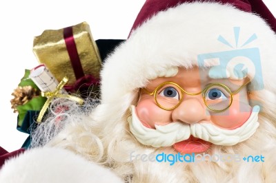 Portrait Of Santa Claus Face And Presents Stock Photo