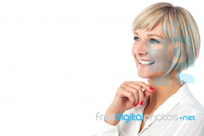 Portrait Of Smiling Aged Woman Stock Photo