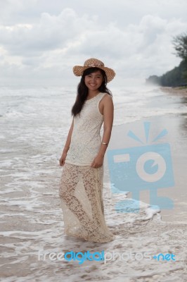 Portrait Of Smiling Face Of Young Asian Woman With Long Dress An… Stock Photo