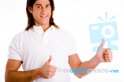 Portrait Of Smiling Male With Thumbsup Stock Photo