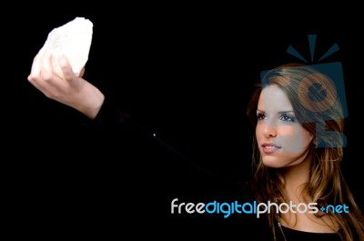 Portrait Of Smiling Woman Looking The Stone Stock Photo