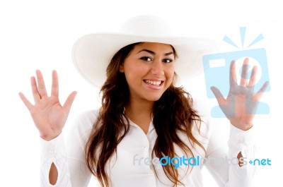 Portrait Of Smiling Woman Showing Her Palms Stock Photo