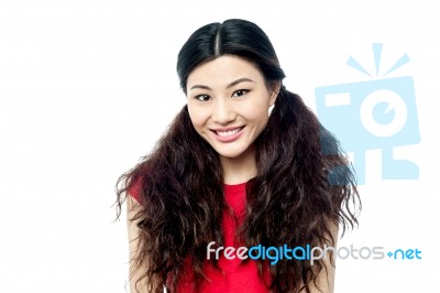 Portrait Of Smiling Young Chinese Girl Stock Photo