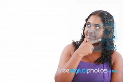 Portrait Of Teenage Girl Smiling And Looking Away Stock Photo