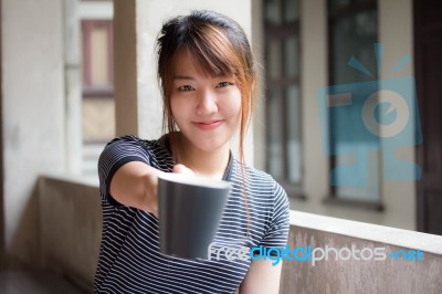 Portrait Of Thai Adult Beautiful Girl Drinking Coffee Stock Photo