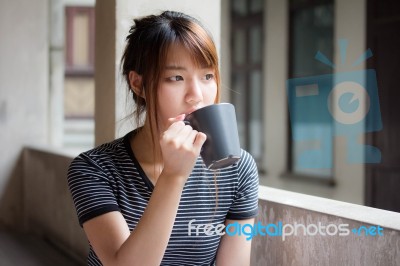 Portrait Of Thai Adult Beautiful Girl Drinking Coffee Stock Photo