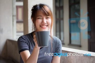 Portrait Of Thai Adult Beautiful Girl Drinking Coffee Stock Photo