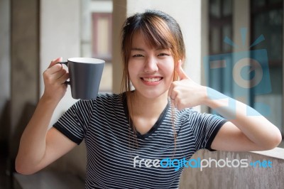 Portrait Of Thai Adult Beautiful Girl Drinking Coffee Stock Photo