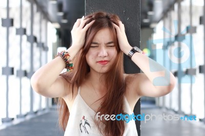 Portrait Of Thai Adult Beautiful Girl Read And Think In University Stock Photo