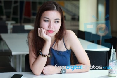 Portrait Of Thai Adult Beautiful Girl Read And Think In University Stock Photo