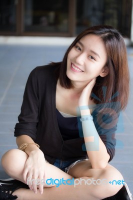 Portrait Of Thai Adult Beautiful Girl Relax And Smile Stock Photo