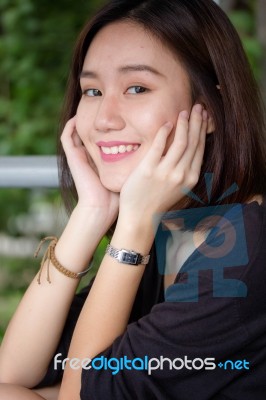 Portrait Of Thai Adult Beautiful Girl Relax And Smile Stock Photo