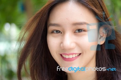 Portrait Of Thai Adult Beautiful Girl Relax And Smile Stock Photo